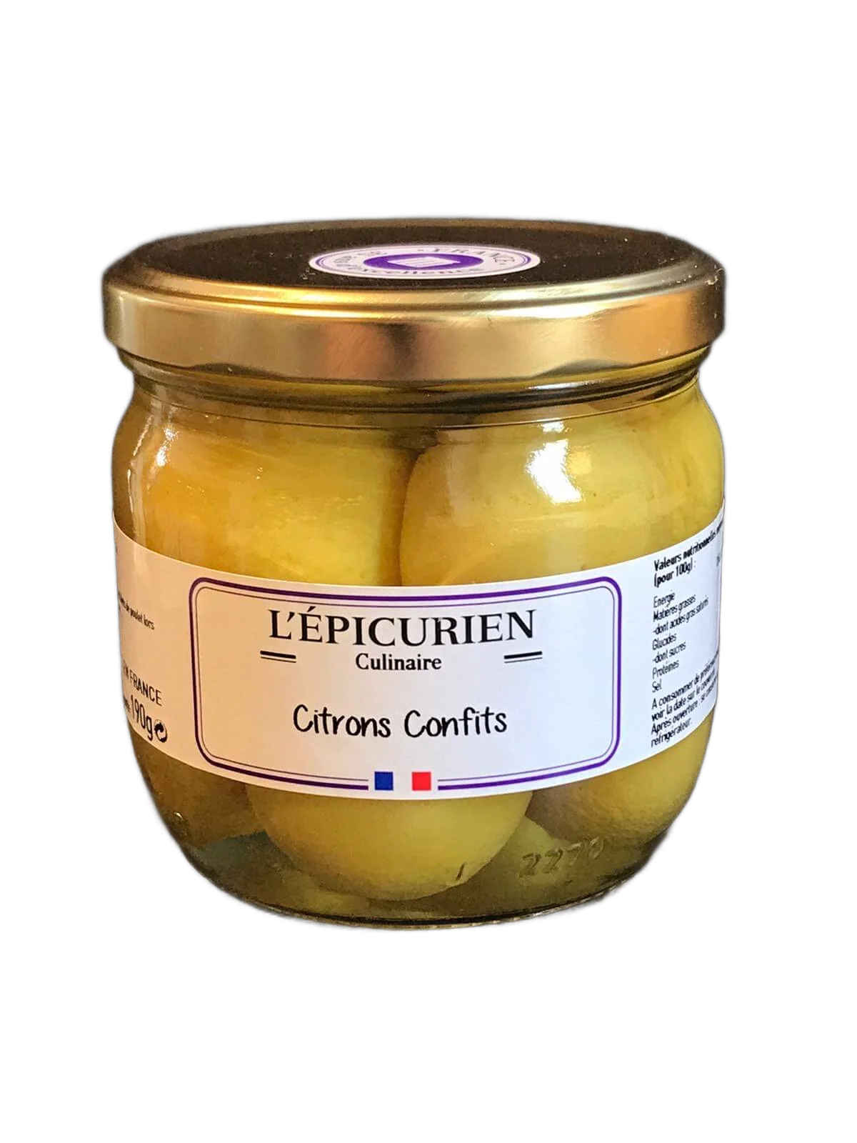 Un bocal en verre de citrons confits avec un couvercle doré et une étiquette blanche L’Épicurien Culinaire.